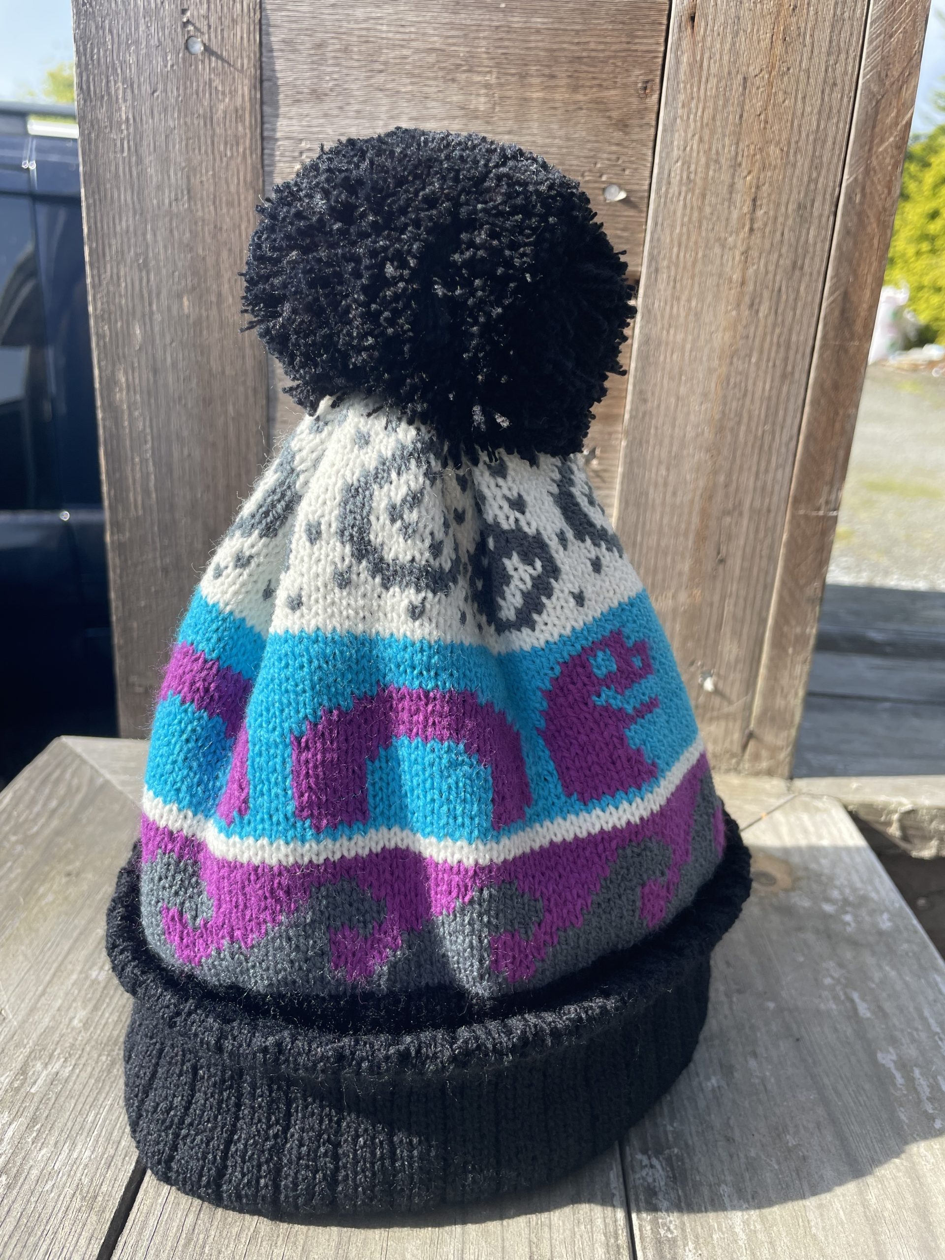 woolly hat with Nessie motif and bobble